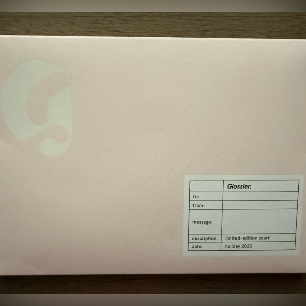 Glossier Limited Edition holiday 2020 scarf. In box never opened.